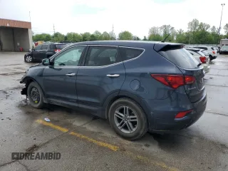 2018 Hyundai Santa Fe 2.4L z VIN 5NMZTDLB7JH077713, wystawiony jako Copart lot #56671245 z przebiegiem 90 442 mil mil oraz Szkoda całkowita • Salvage title. Historia ofert i sprzedaży dostępna na DreamBid. Obrazek 2.