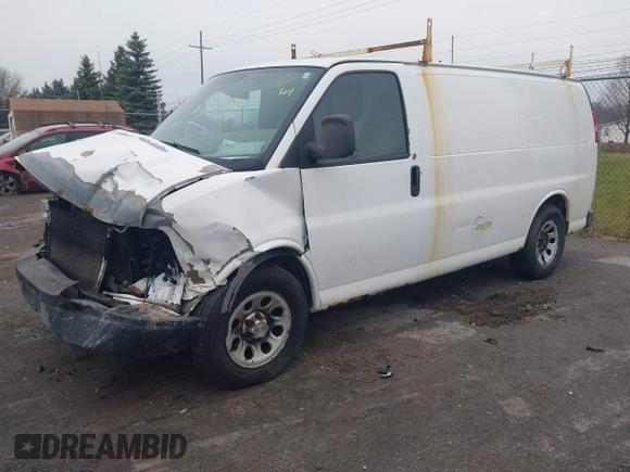 2012 Chevrolet Express Cargo Van with VIN 1GCSGAFX4C1115813, listed as a IAAI auction lot 41197972 with 331,376 mi miles. Bid and sale history available at carsss.com. Image 2.
