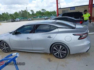 2020 Nissan Maxima SV z VIN 1N4AA6CV6LC366887, wystawiony jako IAAI lot #41952159 z przebiegiem 100 182 mil mil oraz . Historia ofert i sprzedaży dostępna na DreamBid. Obrazek 14.