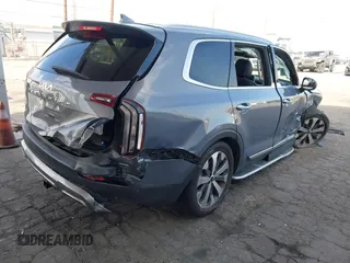 2022 Kia Telluride S with VIN 5XYP6DHC4NG205678, listed as a IAAI auction lot 42012713 with 56,783 mi miles and . Bid and sale history available at DreamBid. Image 4.