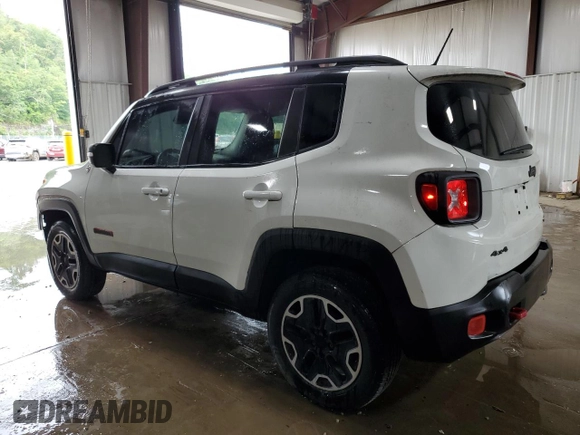 2015 Jeep Renegade Trailhawk with VIN ZACCJBCT8FPB78351, listed as a Copart auction lot 64036095 with 127,784 mi miles and Salvage title. Bid and sale history available at DreamBid. Image 2.