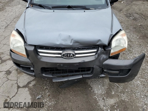 2005 Kia Sportage LX with VIN KNDJF723057062113, listed as a Copart auction lot 66630164 with 129,715 mi miles and Salvage Title. Bid and sale history available at carsss.com. Image 12.