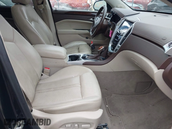 2013 Cadillac SRX Performance Collection z VIN 3GYFNHE39DS642111, wystawiony jako IAAI lot #42470291 z przebiegiem 176 239 mil mil oraz . Historia ofert i sprzedaży dostępna na DreamBid. Obrazek 5.