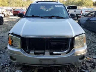 2004 GMC Envoy SLE with VIN 1GKET12S746181543, listed as a Copart auction lot 75818784 with 146,289 mi miles and Salvage Title. Bid and sale history available at DreamBid. Image 5.