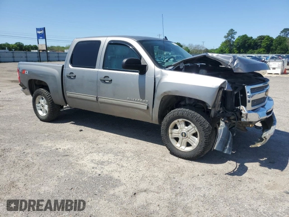 2012 Chevrolet Silverado 1500 LT with VIN 1GCPKSE71CF216239, listed as a Copart auction lot 52108815 with 245,862 mi miles and Salvage Title. Bid and sale history available at DreamBid. Image 4.