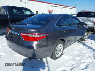 2015 Toyota Camry XLE with VIN 4T4BF1FK6FR465360, listed as a IAAI auction lot 41615471 with 166,584 mi miles. Bid and sale history available at carsss.com. Image 4.