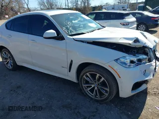 2018 BMW X6 xDrive35i with VIN 5UXKU2C52J0Z61666, listed as a IAAI auction lot 41681194 with 56,617 mi miles. Bid and sale history available at carsss.com. Image 1.
