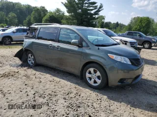 2014 Toyota Sienna LE AAS with VIN 5TDKK3DC9ES424841, listed as a Copart auction lot 59098365 with 168,427 mi miles and Clean title. Bid and sale history available at DreamBid. Image 4.