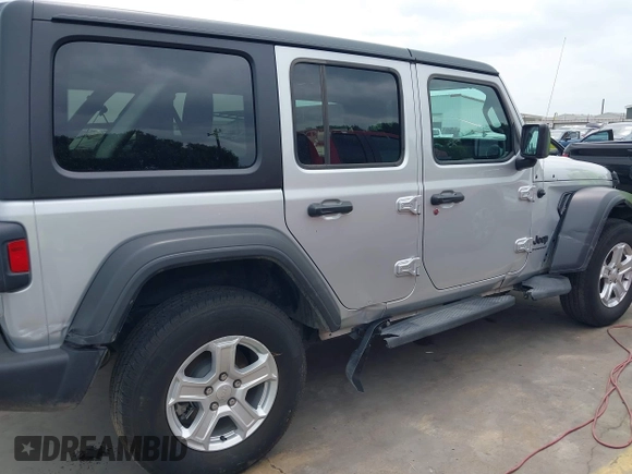 2023 Jeep Wrangler Sport with VIN 1C4HJXDG2PW508235, listed as a IAAI auction lot 42127823 with 25,069 mi miles and . Bid and sale history available at DreamBid. Image 18.