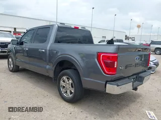 2021 Ford F-150 XL with VIN 1FTEW1CP1MKD21526, listed as a IAAI auction lot 42104907 with 76,317 mi miles and . Bid and sale history available at DreamBid. Image 3.