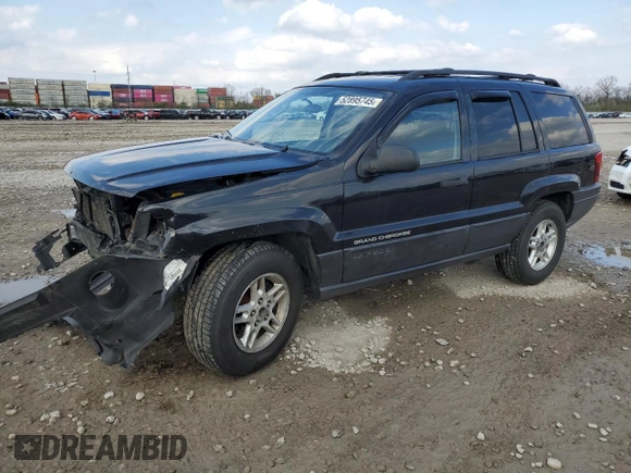 2004 Jeep Grand Cherokee Laredo with VIN 1J4GW48S84C184757, listed as a Copart auction lot 52895745 with 242,307 mi miles and Salvage Title. Bid and sale history available at carsss.com. Image 1.