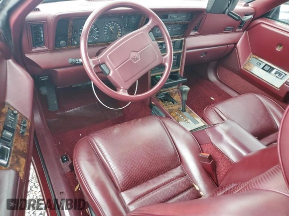 1989 Chrysler LeBaron z VIN 1C3XJ45J8KG223051, wystawiony jako Copart lot #75115464 z przebiegiem 27 923 mil mil oraz Szkody całkowita. Historia ofert i sprzedaży dostępna na DreamBid. Obrazek 8.