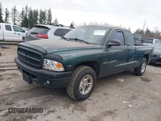 2000 Dodge Dakota Sport with VIN 1B7GL22N6YS764185, listed as a IAAI auction lot 41570275 with 157,334 mi miles. Bid and sale history available at carsss.com. Image 2.