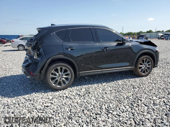 2021 Mazda CX-5 Signature with VIN JM3KFBEY5M0439676, listed as a Copart auction lot 52823285 with 41,811 mi miles and Non Repairable. Bid and sale history available at carsss.com. Image 3.