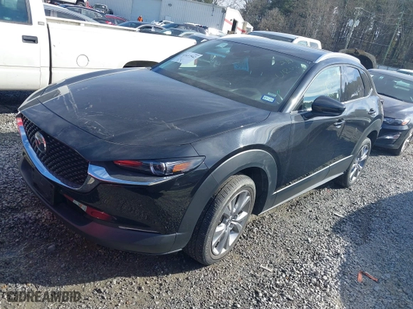 2023 Mazda CX-30 2.5 S Premium Package with VIN 3MVDMBDM7PM528297, listed as a IAAI auction lot 41637542 with 48,935 mi miles. Bid and sale history available at carsss.com. Image 17.