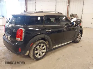 2019 MINI Countryman Cooper with VIN WMZYV5C53K3E05041, listed as a IAAI auction lot 41684566 with 65,237 mi miles. Bid and sale history available at carsss.com. Image 4.