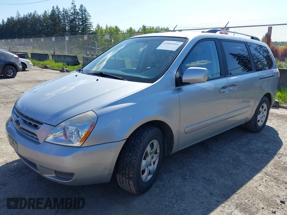 2010 Kia Sedona LX with VIN KNDMG4C3XA6346579, listed as a IAAI auction lot 42085860 with 145,008 mi miles. Bid and sale history available at carsss.com. Image 2.