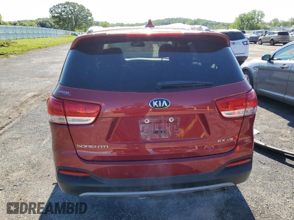 2018 Kia Sorento EX z VIN 5XYPHDA55JG366864, wystawiony jako Copart lot #57825085 z przebiegiem 67 897 mil mil oraz Czysty tytuł • Clean title. Historia ofert i sprzedaży dostępna na DreamBid. Obrazek 6.