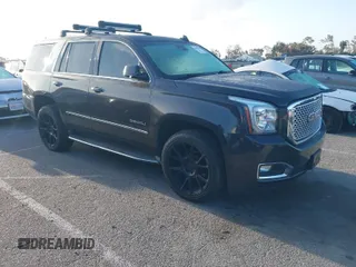 2015 GMC Yukon Denali with VIN 1GKS1CKJ7FR566419, listed as a IAAI auction lot 41948825 with 235,037 mi miles. Bid and sale history available at carsss.com. Image 1.