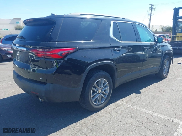 2022 Chevrolet Traverse LT Cloth with VIN 1GNERGKW6NJ106869, listed as a IAAI auction lot 41477954 with 74,130 mi miles. Bid and sale history available at carsss.com. Image 4.