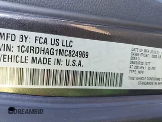 2021 Dodge Durango SXT with VIN 1C4RDHAG1MC824969, listed as a IAAI auction lot 41352831 with 91,188 mi miles and . Bid and sale history available at DreamBid. Image 9.