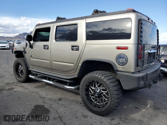 2005 Hummer H2 SUV z VIN 5GRGN23U65H106597, wystawiony jako Copart lot #54508345 z przebiegiem Nie podano mil oraz Szkoda całkowita • Salvage title. Historia ofert i sprzedaży dostępna na DreamBid. Obrazek 2.