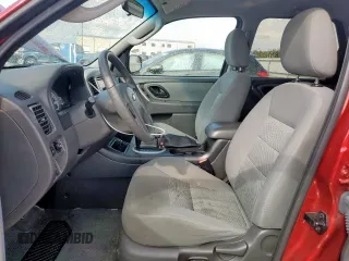 2006 Ford Escape XLT with VIN 1FMYU03196KA38458, listed as a Copart auction lot 64194705 with 102,097 mi miles and Salvage title. Bid and sale history available at DreamBid. Image 7.