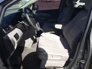 2012 Honda Odyssey LX with VIN 5FNRL5H24CB019934, listed as a Copart auction lot 52412605 with 157,725 mi miles and Salvage Title. Bid and sale history available at carsss.com. Image 7.