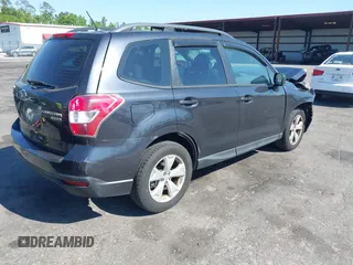 2015 Subaru Forester 2.5i with VIN JF2SJABC6FH823742, listed as a IAAI auction lot 42069857 with 74,966 mi miles. Bid and sale history available at carsss.com. Image 4.
