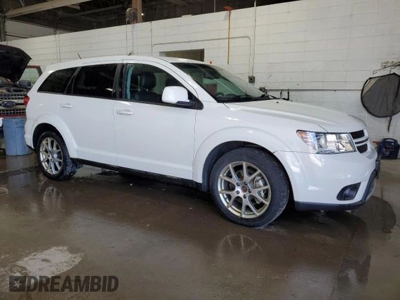 2013 Dodge Journey R/T with VIN 3C4PDDEG5DT607603, listed as a Copart auction lot 56335215 with 195,863 mi miles and Clean title. Bid and sale history available at DreamBid. Image 4.