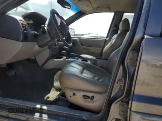 1999 Jeep Grand Cherokee Laredo с VIN 1J4GW58S5XC612309, выставлен на аукционе Copart как лот 56705085 с пробегом 200 004 миль миль и Списание • Salvage title. История ставок и продаж доступна на DreamBid. Изображение 7.