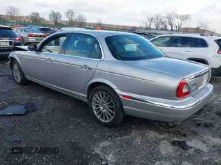 2006 Jaguar XJ with VIN SAJWA71B96SH04571, listed as a IAAI auction lot 41574323 with 1 mi miles. Bid and sale history available at carsss.com. Image 3.