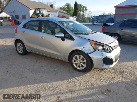 2013 Kia Rio LX with VIN KNADM5A32D6168492, listed as a IAAI auction lot 42144898 with 127,228 mi miles. Bid and sale history available at carsss.com. Image 1.