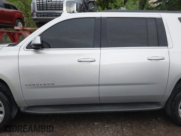 2015 Chevrolet Suburban LT with VIN 1GNSCJKC9FR617227, listed as a IAAI auction lot 42127511 with 167,924 mi miles and . Bid and sale history available at DreamBid. Image 14.
