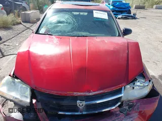 2008 Dodge Avenger SXT with VIN 1B3LC56R98N169618, listed as a IAAI auction lot 40626545 with 153,921 mi miles. Bid and sale history available at carsss.com. Image 10.