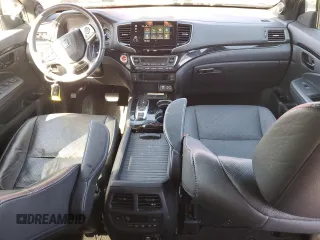 2023 Honda Passport Elite with VIN 5FNYF8H06PB013044, listed as a Copart auction lot 48347315 with 44,250 mi miles and Salvage Title. Bid and sale history available at DreamBid. Image 8.