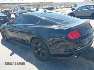 2021 Ford Mustang GT z VIN 1FA6P8CF4M5149580, wystawiony jako IAAI lot #41878355 z przebiegiem 60 028 mil mil oraz . Historia ofert i sprzedaży dostępna na DreamBid. Obrazek 3.