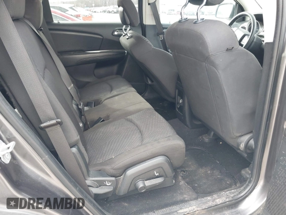 2017 Dodge Journey SE with VIN 3C4PDCABXHT694909, listed as a IAAI auction lot 41640828 with 188,657 mi miles and . Bid and sale history available at DreamBid. Image 8.