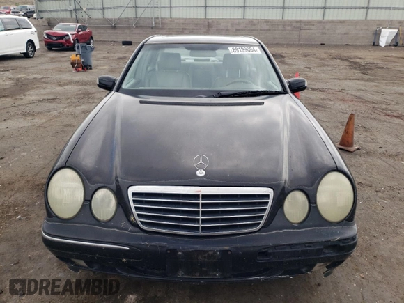 2000 Mercedes-Benz E-Class with VIN WDBJF65J5YB068297, listed as a Copart auction lot 69199004 with 236,751 mi miles and Salvage Title. Bid and sale history available at carsss.com. Image 5.
