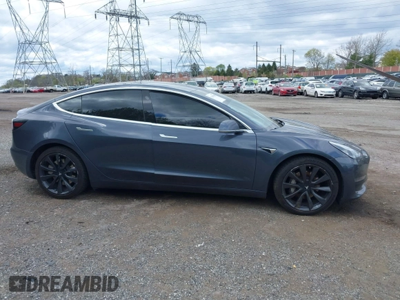 2020 Tesla Model 3 Long Range with VIN 5YJ3E1EB2LF646449, listed as a IAAI auction lot 42059086 with 120,981 mi miles and . Bid and sale history available at DreamBid. Image 14.