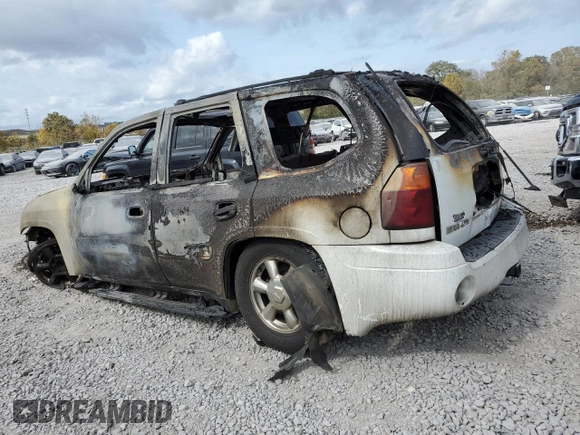 2005 GMC Envoy SLE with VIN 1GKDS13S752125396, listed as a Copart auction lot 78801934 with Not provided miles and Non repairable. Bid and sale history available at DreamBid. Image 2.