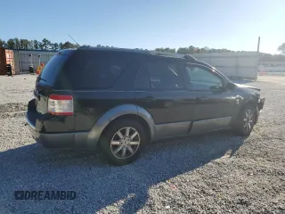 2008 Ford Taurus X SEL with VIN 1FMDK05W68GA33723, listed as a Copart auction lot 81121974 with 309,668 mi miles and Salvage Title. Bid and sale history available at DreamBid. Image 3.