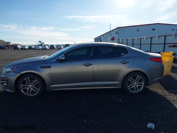2013 Kia Optima SX w/Limited Pkg with VIN 5XXGR4A67DG191290, listed as a IAAI auction lot 41864684 with 136,525 mi miles. Bid and sale history available at carsss.com. Image 15.