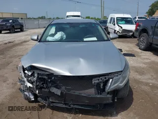 2019 Kia Optima LX z VIN 5XXGT4L37KG281329, wystawiony jako IAAI lot #42434855 z przebiegiem 113 448 mil mil oraz . Historia ofert i sprzedaży dostępna na DreamBid. Obrazek 12.