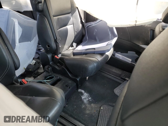 2015 Toyota Sienna SE with VIN 5TDXK3DC1FS655269, listed as a Copart auction lot 53682015 with 100,686 mi miles and Salvage Title. Bid and sale history available at DreamBid. Image 11.