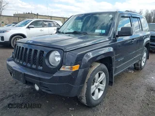 2014 Jeep Patriot Latitude with VIN 1C4NJRFB9ED778409, listed as a IAAI auction lot 41952027 with 88,306 mi miles and . Bid and sale history available at DreamBid. Image 17.