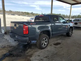 2020 Chevrolet Colorado 2WD Z71 with VIN 1GCGSDEN5L1158451, listed as a Copart auction lot 47039105 with 53,685 mi miles and Salvage title. Bid and sale history available at DreamBid. Image 3.