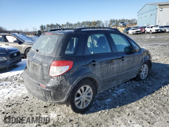 2013 Suzuki SX4 Crossover z VIN JS2YB5A39D6100013, wystawiony jako Copart lot #42423105 z przebiegiem 167 398 mil mil oraz Szkoda całkowita • Salvage title. Historia ofert i sprzedaży dostępna na DreamBid. Obrazek 3.