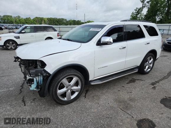 2013 Dodge Durango Citadel with VIN 1C4RDHEG6DC658958, listed as a Copart auction lot 60304945 with 209,250 mi miles and Salvage title. Bid and sale history available at DreamBid. Image 1.