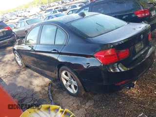 2015 BMW 3 Series 328i with VIN WBA3A5C59FF609332, listed as a IAAI auction lot 41994091 with 194,245 mi miles. Bid and sale history available at carsss.com. Image 3.
